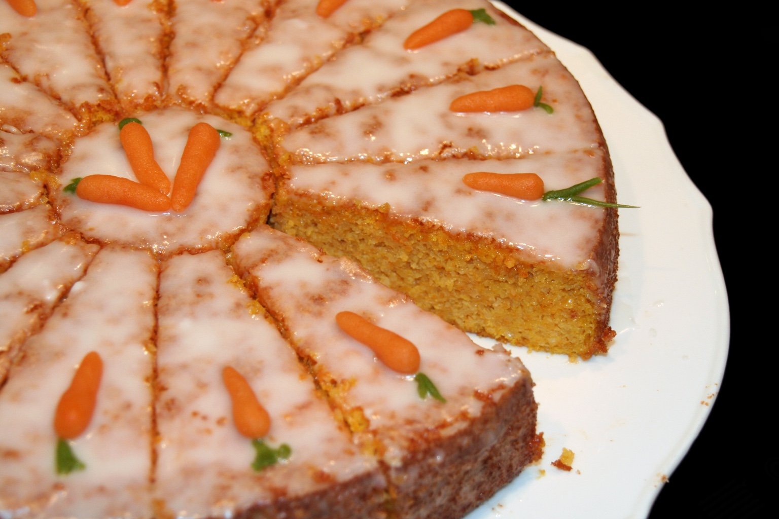 Swiss Rüeblitorte carrot cake with icing and marzipan carrots